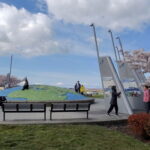 Larry Berg Flight Path Park benches and cherry blossoms Richmond BC