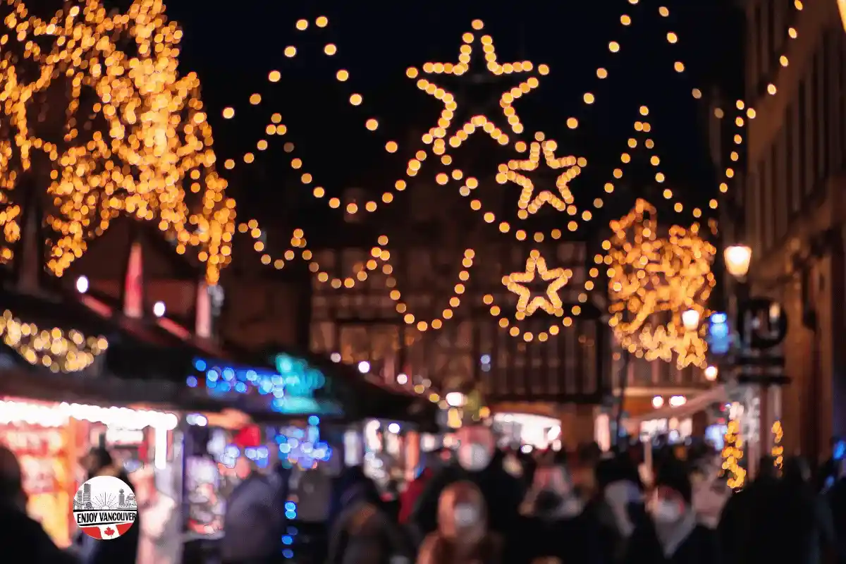 Illuminated wooden stalls at a festive Christmas market