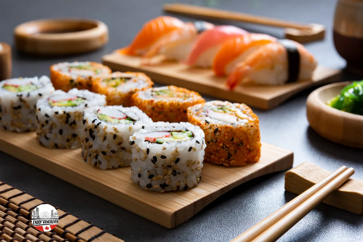 Sushi dishes and cocktails arranged on a restaurant table